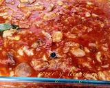 Foto del paso 8 de la receta Manitas de cerdo con tomate, jamón y morro