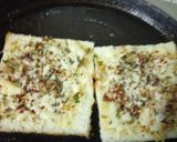 A picture of step 2 of Cheesy garlic bread.