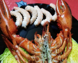 Foto del paso 3 de la receta: Bogavante abierto con langostinos y cogollos de lechuga abiertos