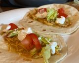 A picture of step 3 of Slow cooker queso chicken tacos.