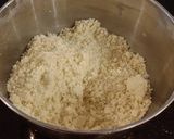 A picture of step 4 of Vanilla Layer Cake with Lemon Cream Filling and Lemon Whipped Cream Frosting.