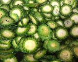 A picture of step 3 of Bitter gourd and black grams veg.