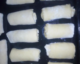 A picture of step 11 of Strawberry and peanut butter rolls.