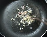 Hình bước làm 4 của món Trứng cút chiên mắm tỏi