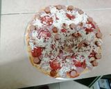 A picture of step 4 of Choma sausage pizza.