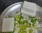 A picture of step 1 of Paneer Paratha with Spring Onions.