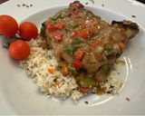 A picture of step 6 of Creole Smothered Pork Chops.