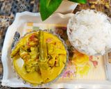 A picture of step 6 of Avial curry with rice.