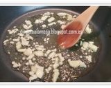 Foto del paso 3 de la receta Níscalos al ajillo con jamón
