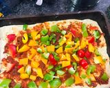 A picture of step 3 of Veggie Loaded pizza with homemade dough.