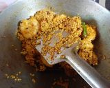 A picture of step 4 of Chingri Moong Daal.