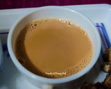 A picture of step 5 of Ginger cardamom milk tea.