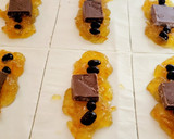 Foto del paso 4 de la receta: Cañas de hojaldre rellenas de turrón de chocolate y mermelada de naranja