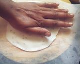 A picture of step 5 of Rice flour chapati with green chutney.