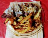 Foto del paso 5 de la receta: Vacío marinado al horno con papas