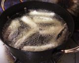 A picture of step 3 of Broiled Pacific sauries.