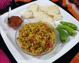 A picture of step 8 of Vegetable Broken Wheat khichdi.