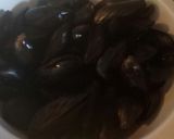 A picture of step 1 of Brandy, garlic and butter mussels.