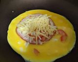 A picture of step 4 of One Pan Tortilla Egg, Ham & Cheese Wrap 🍳🧀🍖.
