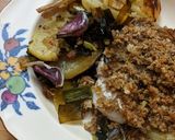A picture of step 7 of Baked hake with Parmesan crumb, potatoes + leeks.