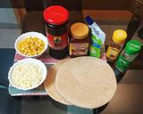 A picture of step 1 of Olive & Corn Pizza.
