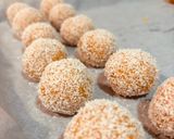A picture of step 8 of “PANELLETS” (sweet potato balls made with coconut, pine nuts, or almonds).