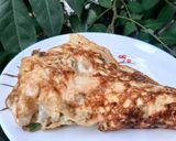 Hình bước làm 2 của món Trứng chiên nấm rơm hành tây