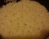 A picture of step 1 of Rice served with yellow beans.