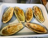 A picture of step 23 of Beef, Spice, and Vegetable Stuffed Eggplants.
