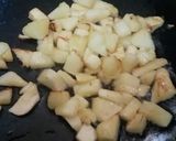 A picture of step 4 of Thai style fried rice with pineapple.