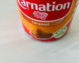 A picture of step 1 of Caramel badam paak (Caramel almond fudge).