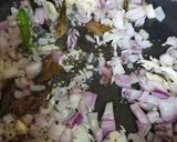 A picture of step 2 of Garlic masala rice.