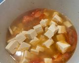 A picture of step 5 of Vietnamese Tofu Chive Soup.