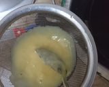 A picture of step 5 of Chocolate Donuts filled with custard.
