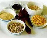 A picture of step 1 of Ellu satham (ellorai in Tamil)-Rice cooked with sesame seed masala powder.