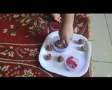 A picture of step 6 of Dates Ladoo or Lollipop Recipe.