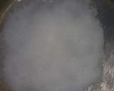 A picture of step 4 of Eggless cooker cake.