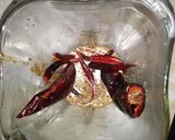 A picture of step 3 of Camarones a la Diabla.