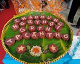 A picture of step 6 of Bánh Tét Chữ (Vietnamese Sticky Rice Cake with Letter Design).