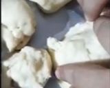 A picture of step 7 of Lussekatter- A Swedish Bun.