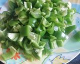 A picture of step 1 of Capsicum, Fry potato and Tomato Subji.