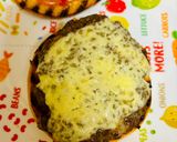 A picture of step 8 of Cheddar cheeseburger with potatoes and salad.