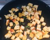 A picture of step 2 of Crunchy Garlic & Thyme Croutons.