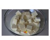 Foto del paso 2 de la receta: Cómo hacer ganache de chocolate blanco y cómo teñirlo