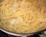 A picture of step 1 of Garlic Butter corn Spaghetti.