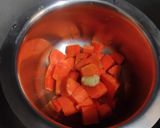 A picture of step 1 of Carrot Yogurt Sunshine smoothie.