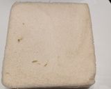 A picture of step 2 of Ham, cheddar and HP brown sauce fried toastie.