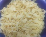 A picture of step 1 of Chicken fettuccine creamy pink pasta.