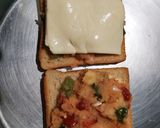 A picture of step 4 of Bombay masala cheese toast.