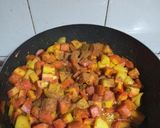 A picture of step 14 of Gajar Aloo Matar.
